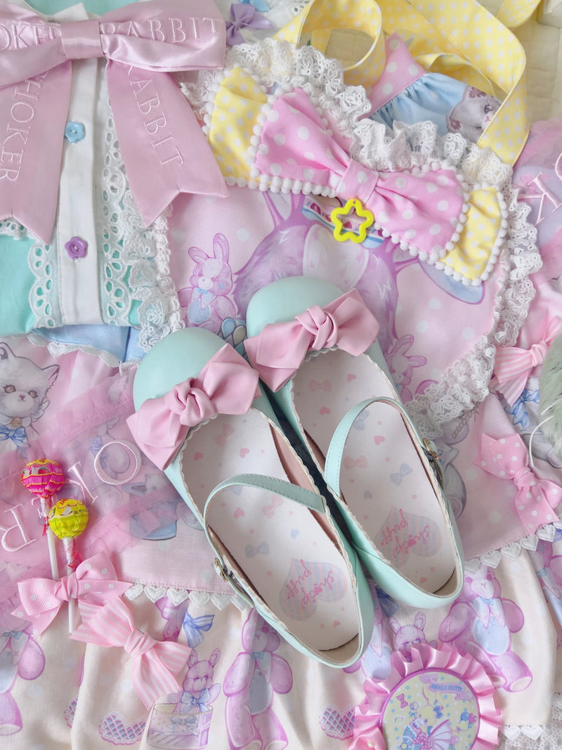 Sheep Puff Lolita shoes with rounded bow design in soft pastel colors, showcasing cute and stylish footwear.