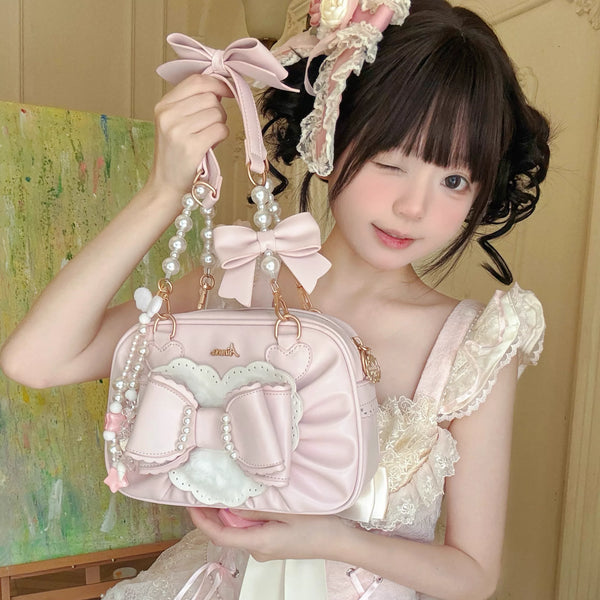 Aimee pink Peach Small Square Box handbag with oversized bow and pearl details