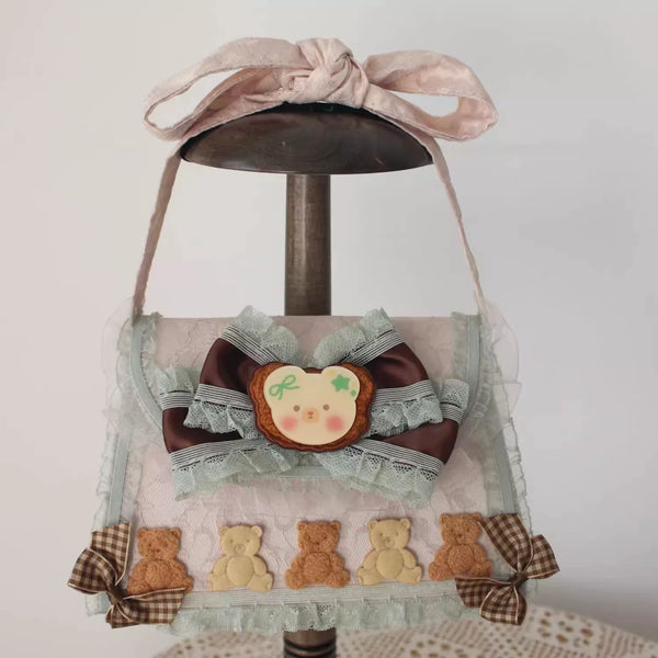 Mint and chocolate Lolita headwear and accessory options displayed on stands.