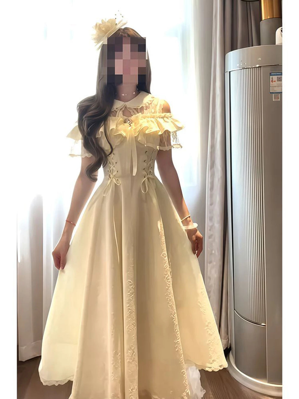 Pale cream OP dress with ruffled shoulders, waist lacing and lace panels worn by a model