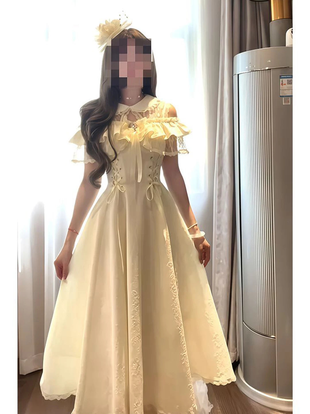 Pale cream OP dress with ruffled shoulders, waist lacing and lace panels worn by a model