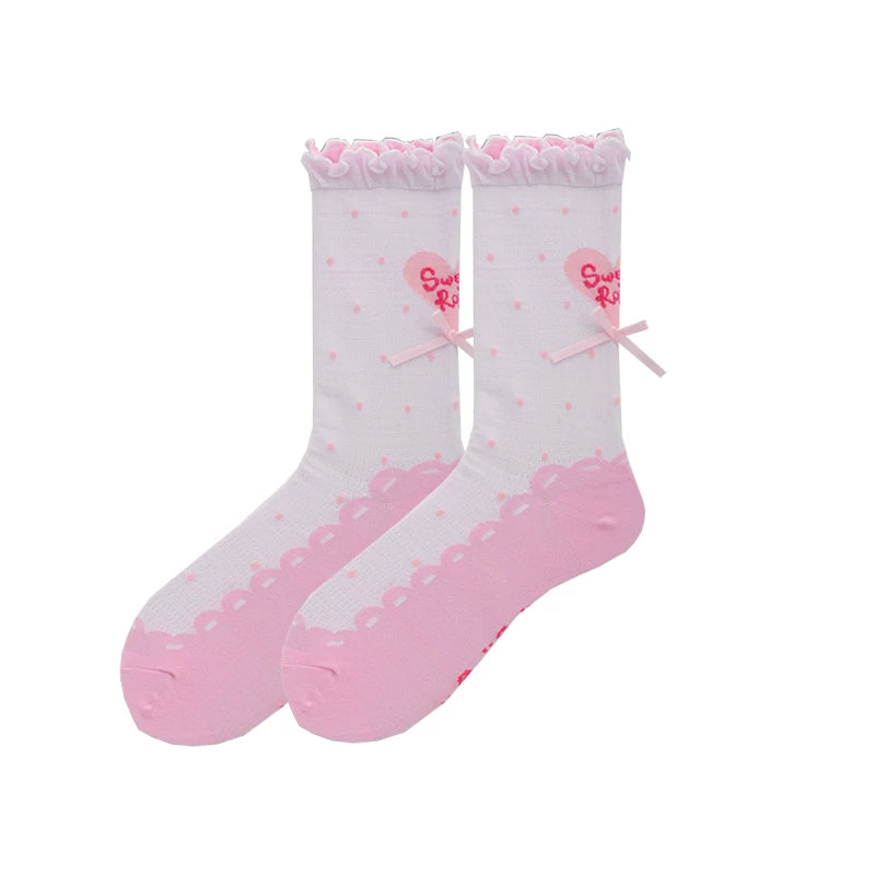 Pink Lolita socks with polka dots, heart motif, ruffled cuff, and bow