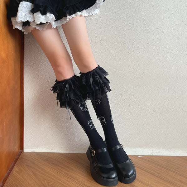 White Sweet Lolita mid-calf sock with tiered lace ruffle cuff and bow details