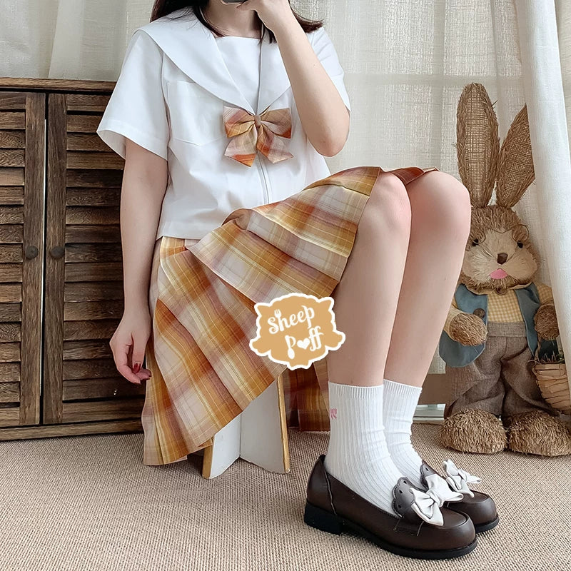 Sheep Puff brand sheep-shaped puff bow shoe clips accessory attached to a shoe, adding a cute decorative touch.