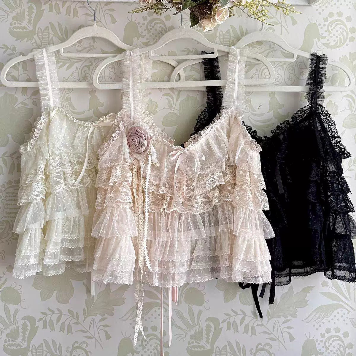 Pink tiered ruffle Lolita camisole with sheer dotted tulle, scalloped lace trim, and 3D fabric rose appliqué