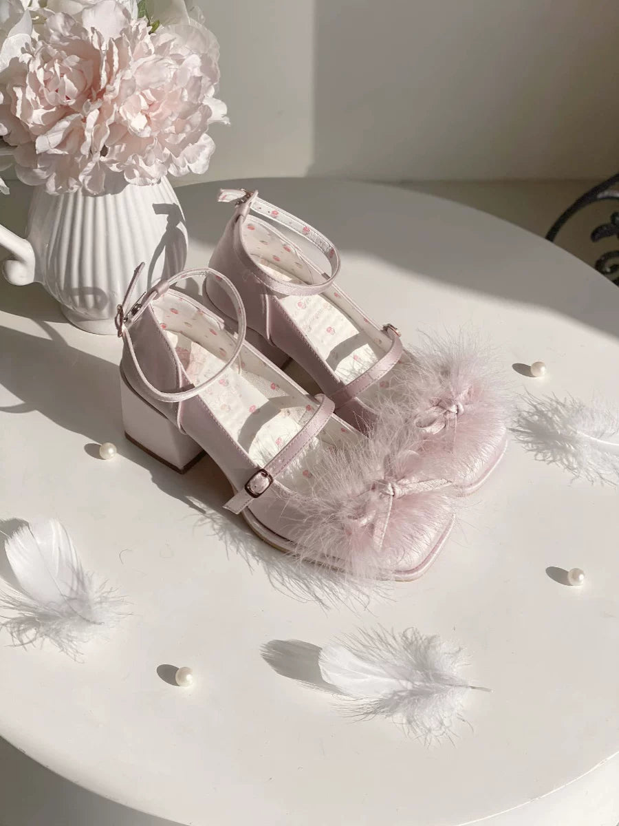 Elegant white tea-themed Lolita Fetch butterfly bow hair accessory with feathers, perfect for a dreamy, youthful, and versatile style.