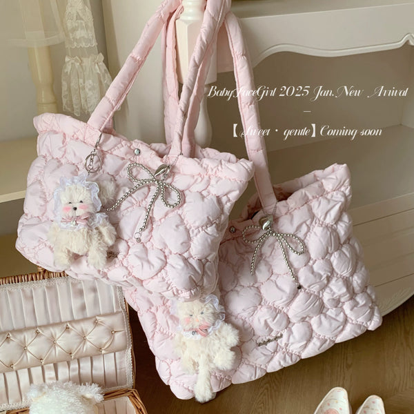 BabyFaceGirl light pink pleated shoulder tote bag with a dimensional heart detail.