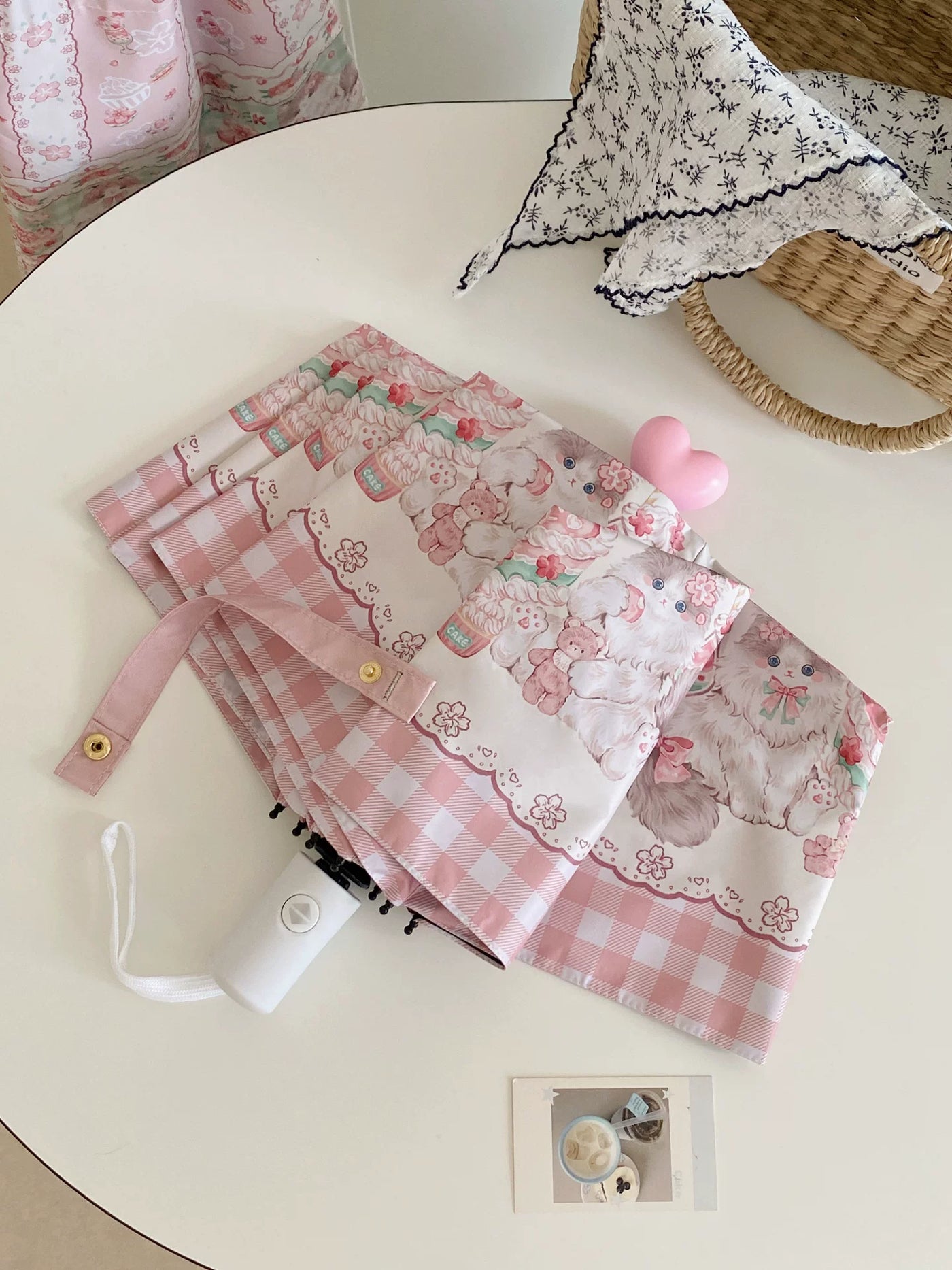 Pink illustrated cat-motif sun/rain umbrella with cherry-blossom print and scalloped border