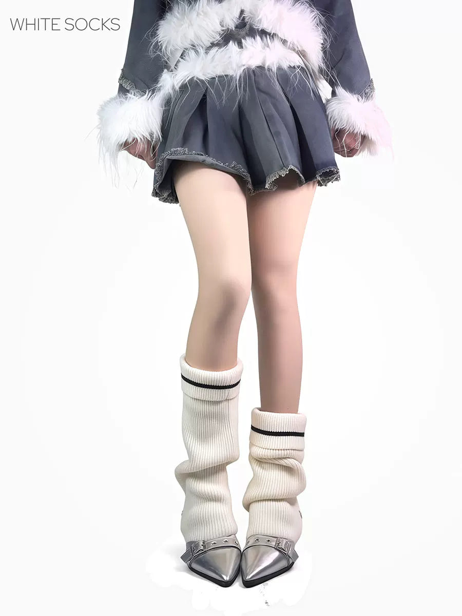 White and grey scrunched leg-warmer socks with contrasting bands and metal buckle detail