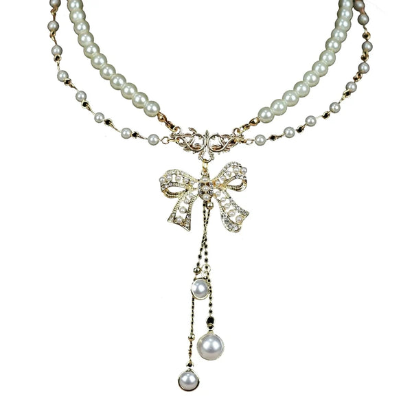 Artificial pearl Lolita necklace with jeweled bow pendant and pearl drops