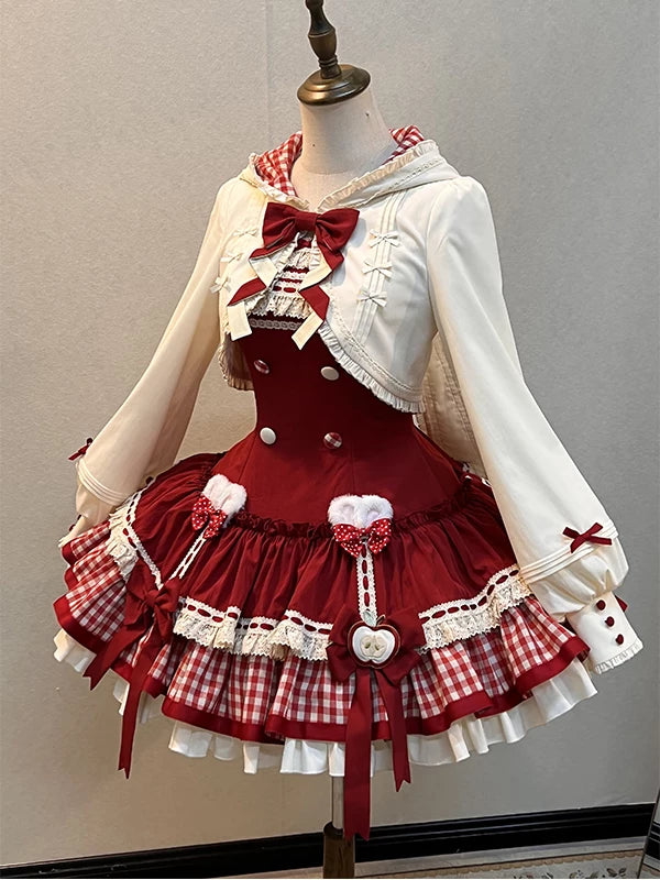 Red and cream JSK dress set with a white long-sleeve outerwear piece on a mannequin.