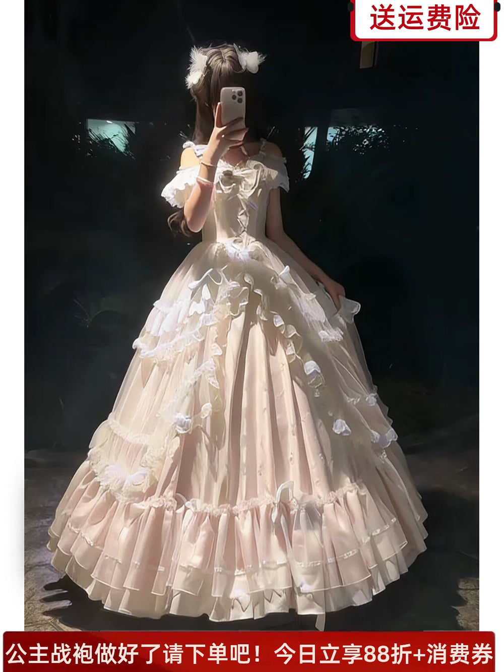 Pink Lolita formal ballgown with off-shoulder ruffled sleeves and tiered ruffled skirt, front view