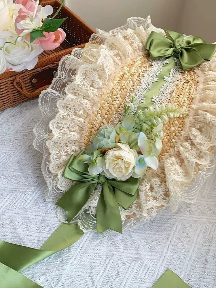 Fantasy Doll green flat straw hat with layered lace, floral decoration and ribbon bow