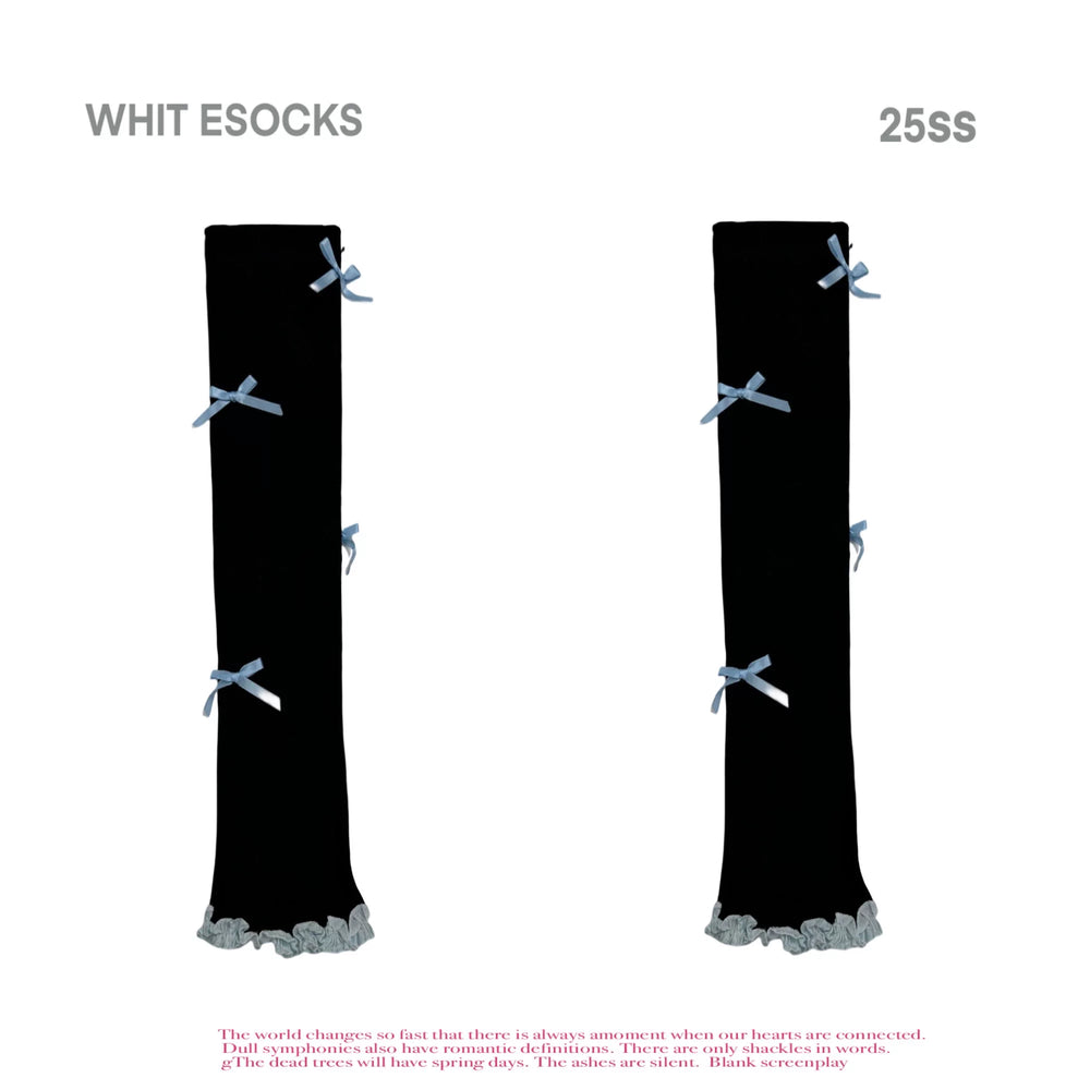 Black and blue bow-trimmed slouch leg warmers with ruffled hems