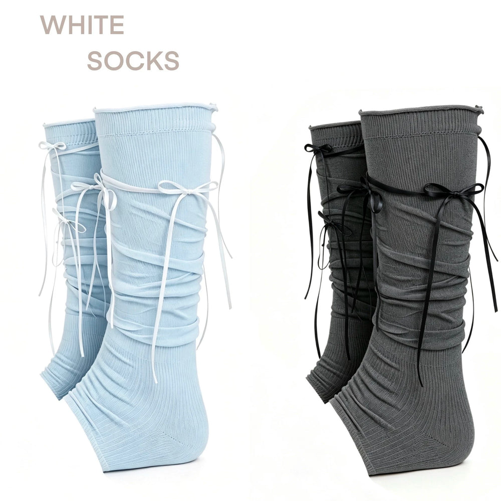 Light blue and dark gray footless stirrup socks with layered ribbon ties displayed as pairs