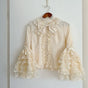 S / Blouse abricot seulement