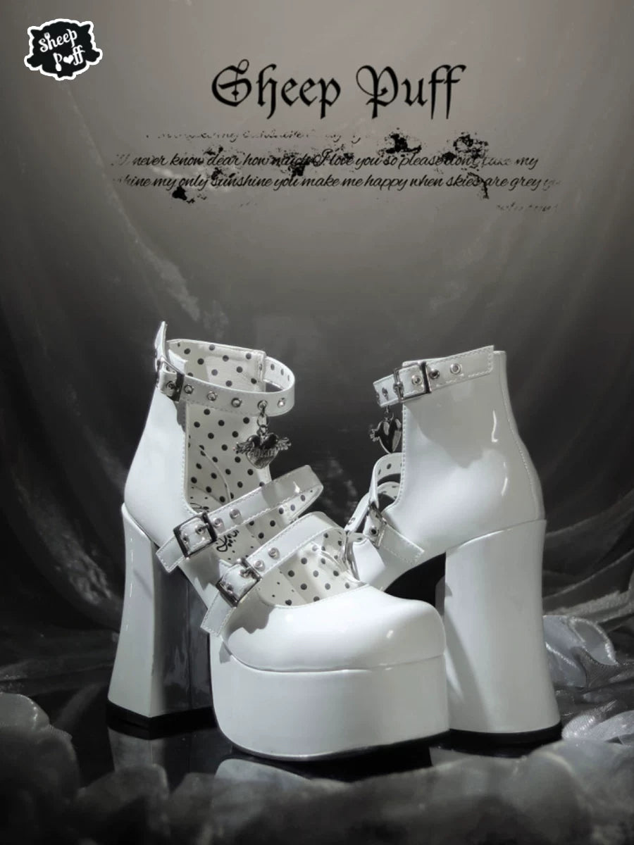 Sheep Puff Broken Angel Lolita heels featuring a black and white design with decorative angel wing details and a chunky heel.