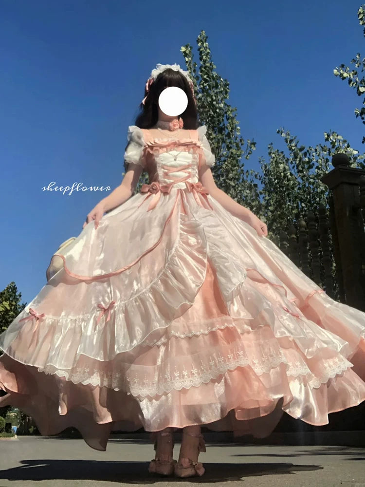 Blush pink sweet lolita ballgown dress with puffed short sleeves and satin waist bow, side view