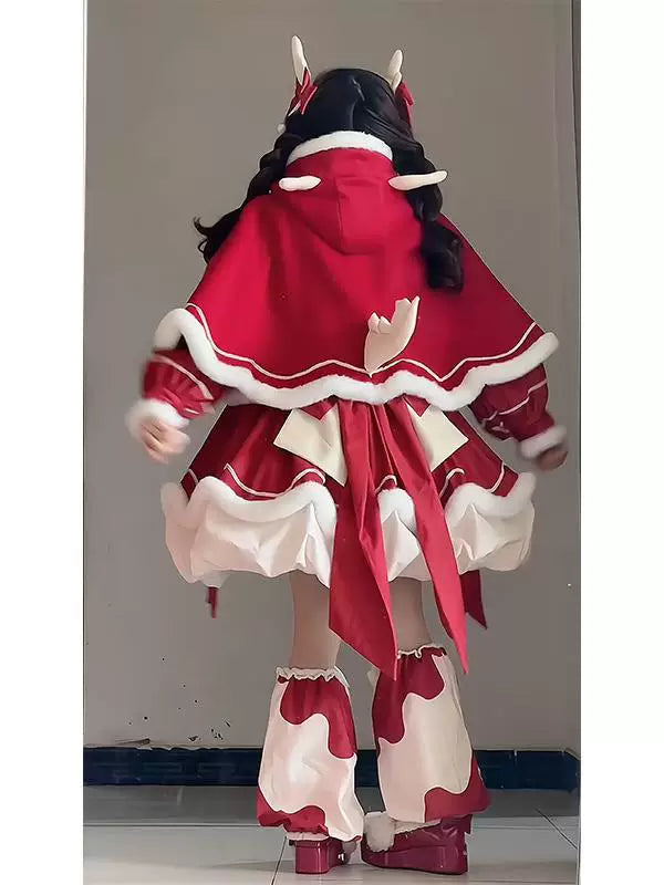 Model wearing a red-and-white OP dress set with cape and train