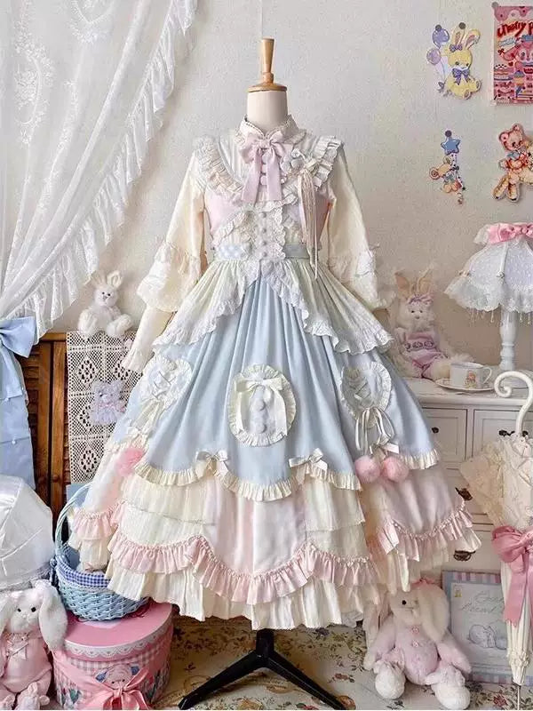 Creamy blue-and-pink short-length princess dress on a mannequin