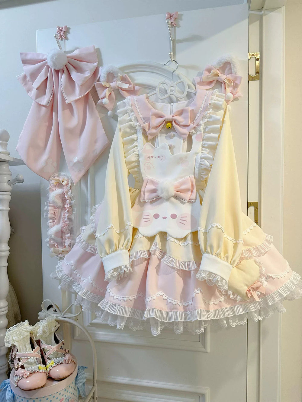Dream Bunny pastel Tea Cat long-sleeve OP with cat apron, bows and layered ruffles.