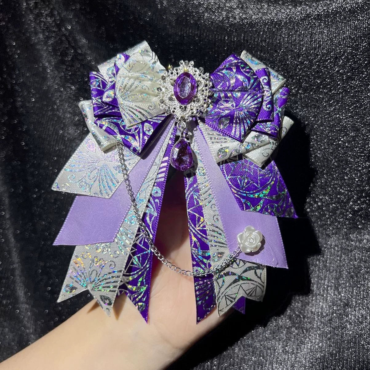 xxc230589 - Snowflake Diamond Bow - Layered bow brooch with a dangling chain