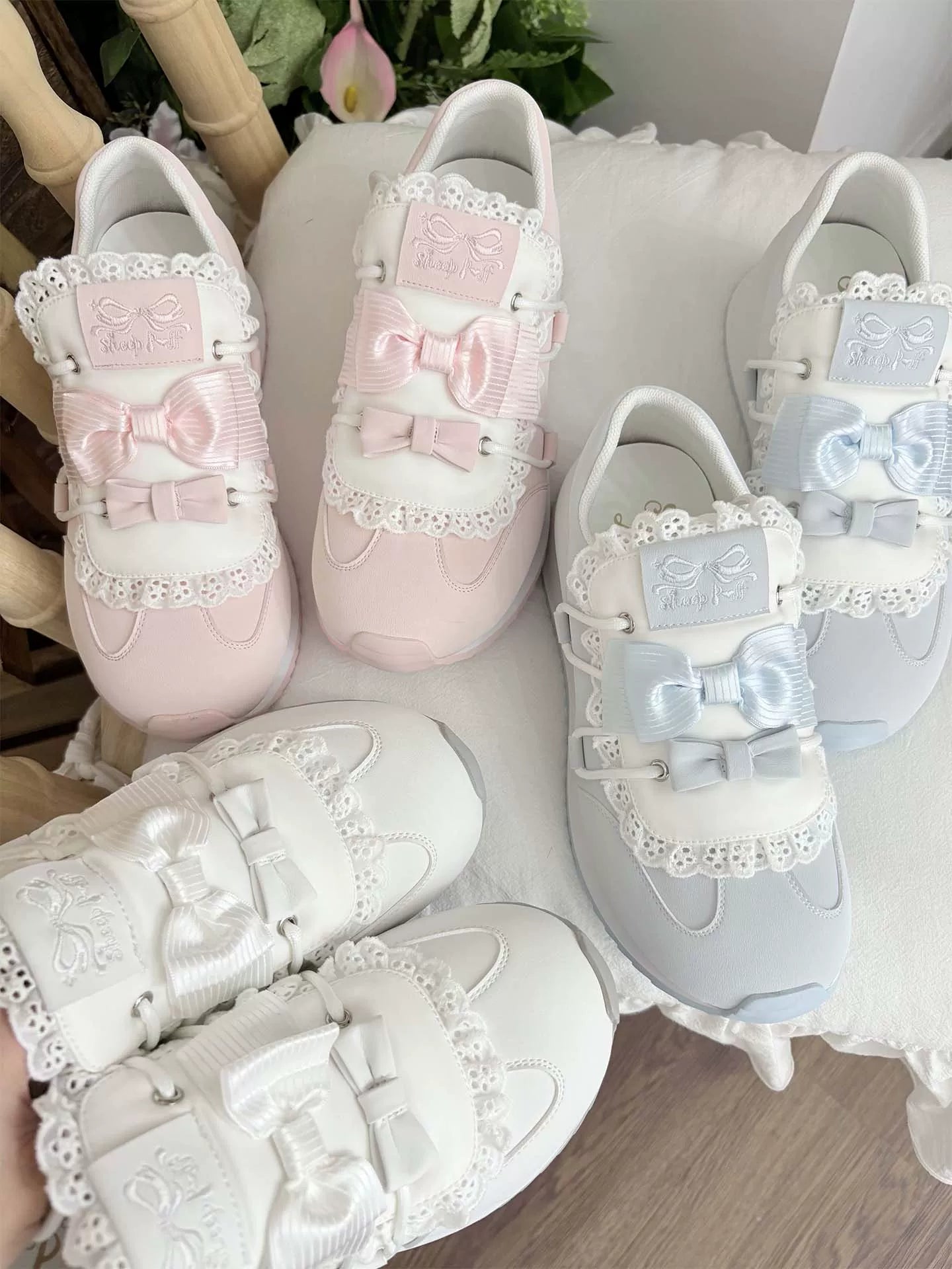 Sheep Puff Thousand Bow Lolita sneakers featuring cute sheep puff design and colorful bow accents on stylish shoes