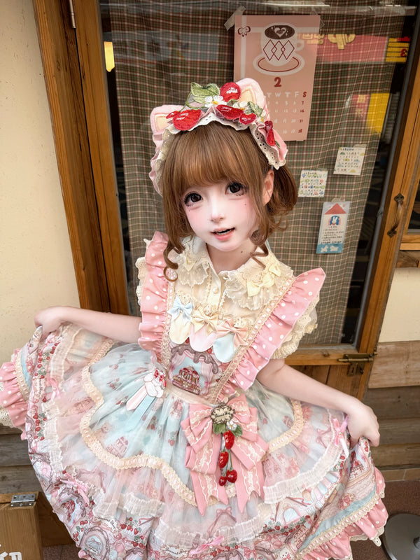 Dessert-themed sweet lolita JSK dress with lace trim displayed on hanger against lace backdrop