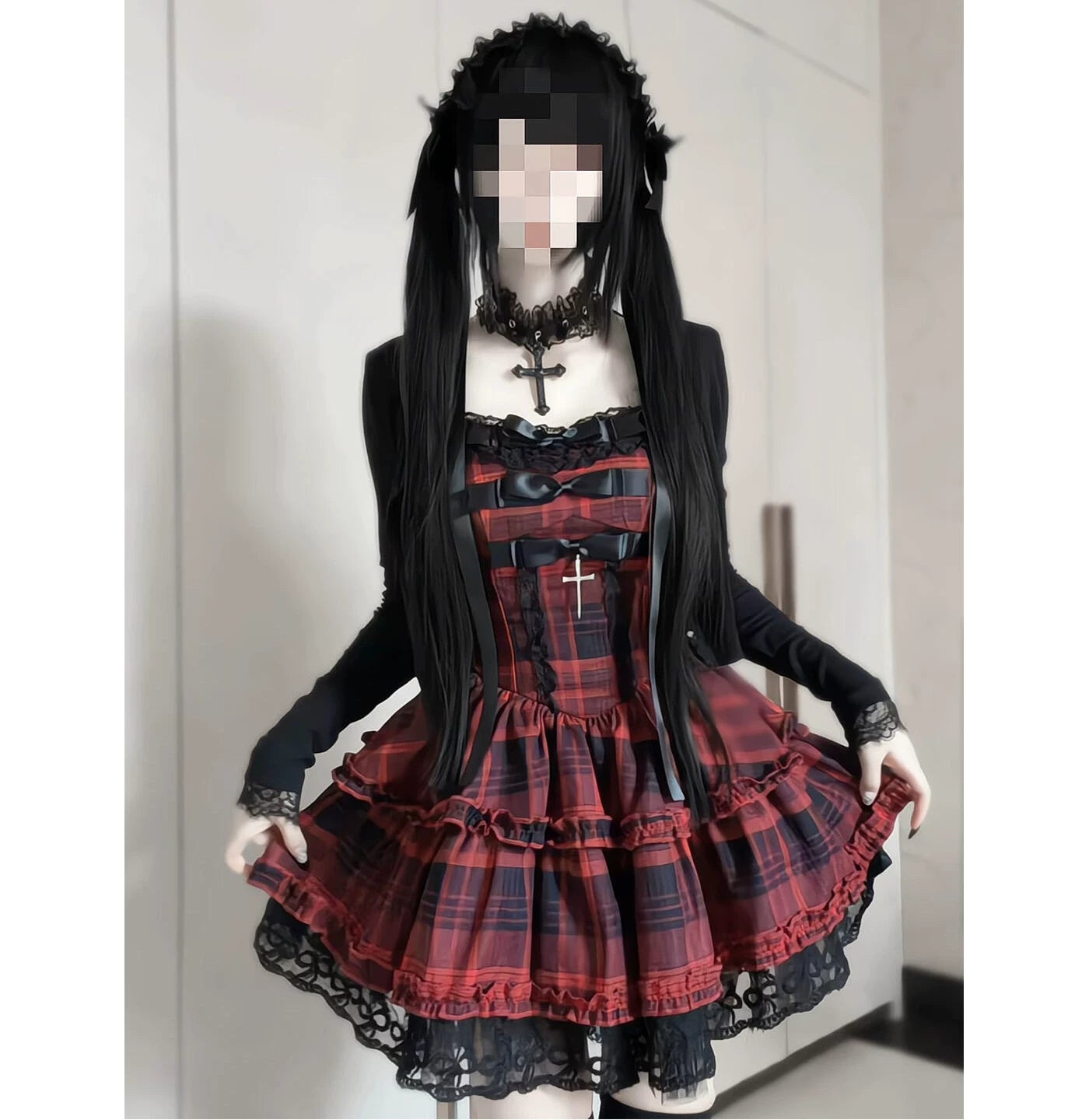 Red-and-black plaid JSK dress with black cardigan, bows, lace ruffles, and layered skirt.