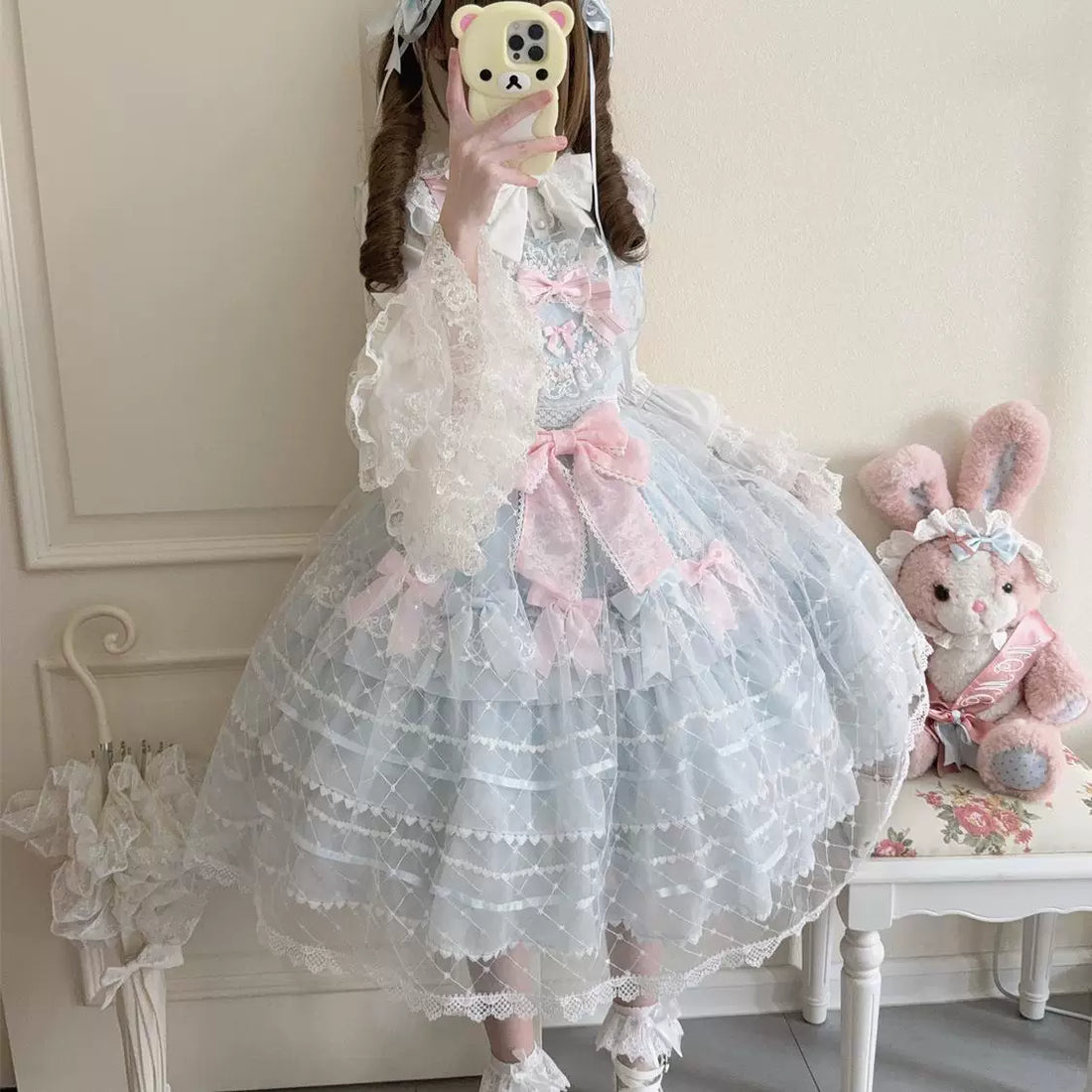 Lady Han Camellia Cherry Overture sweet JSK dress by Lolita Fetch, featuring a floral cherry blossom pattern on a pink fabric.