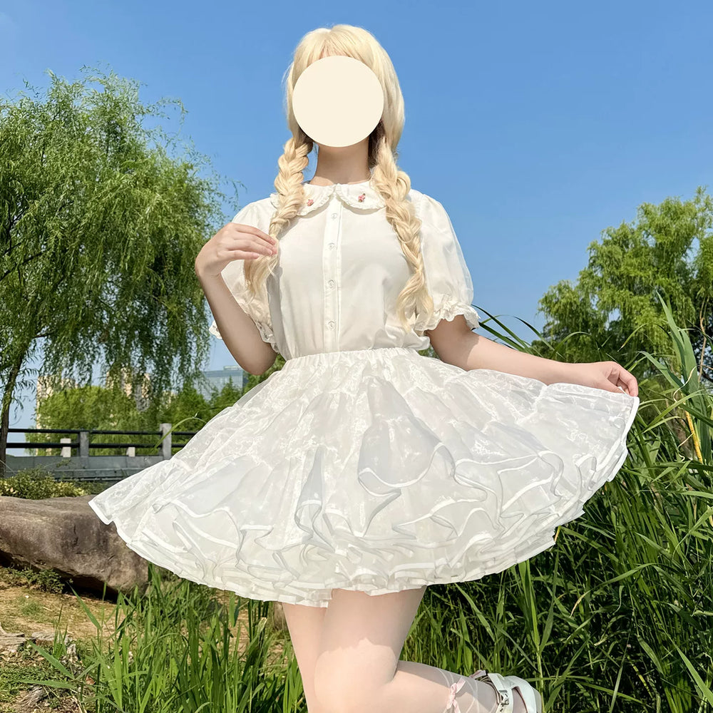 White tiered ruffled tulle Lolita petticoat laid flat