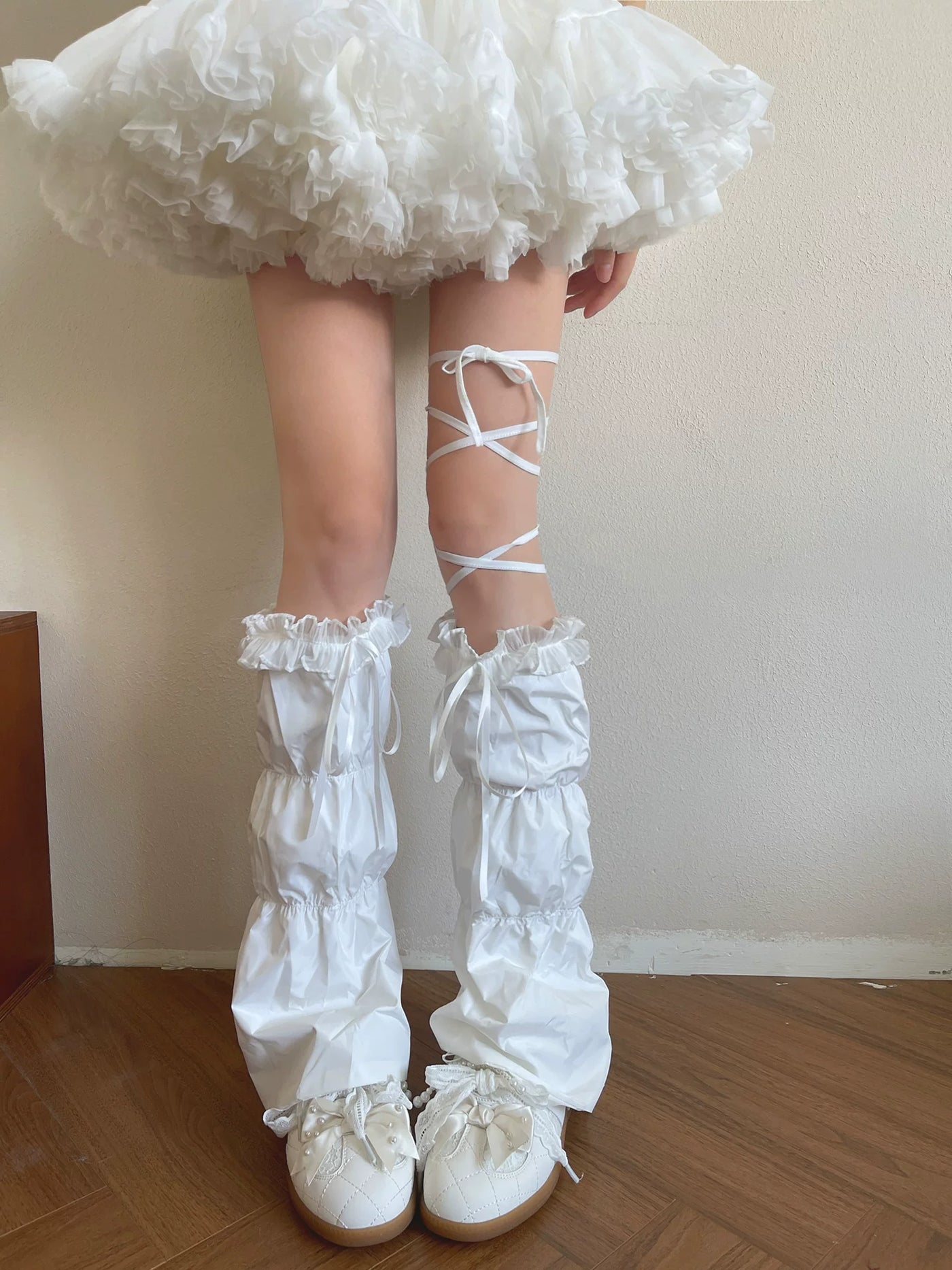 White Sweet Lolita tiered leg coverings with ribbon ties and ruffled cuffs