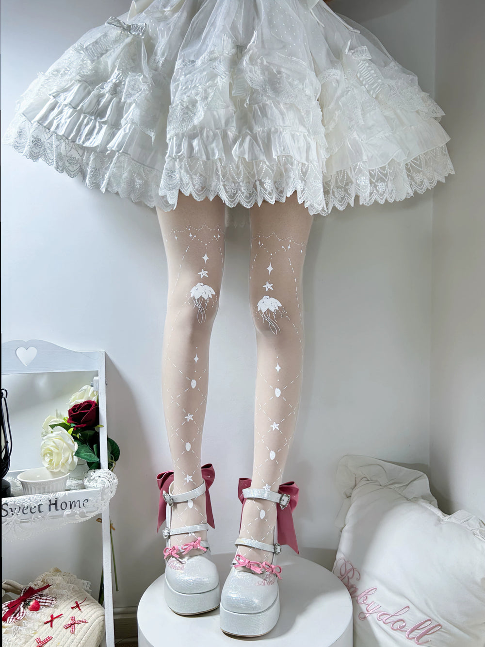 White Star Mist Jellyfish pantyhose with star markings and jellyfish motifs.