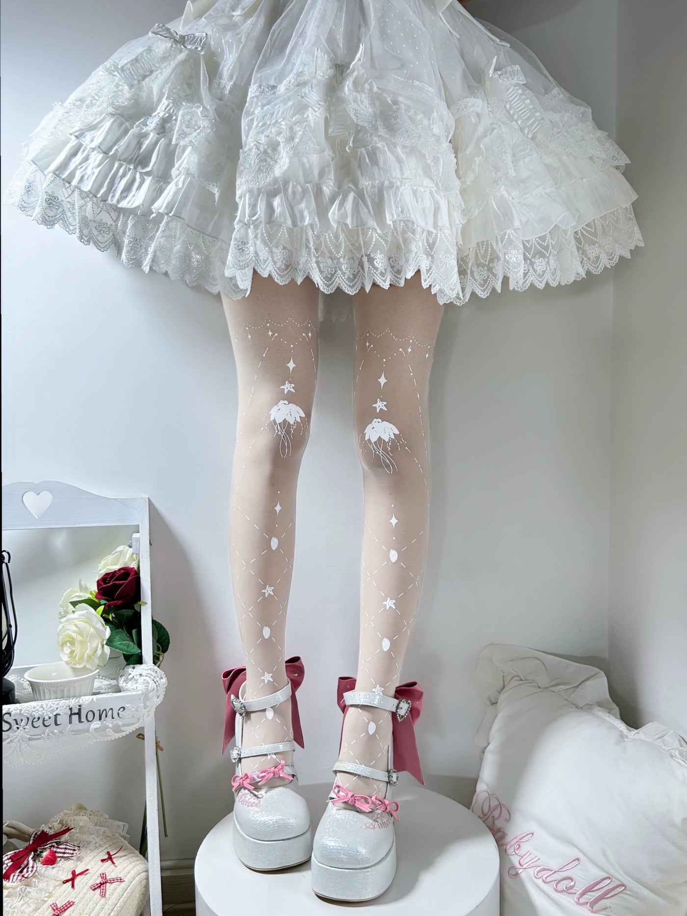 White Star Mist Jellyfish pantyhose with star markings and jellyfish motifs.