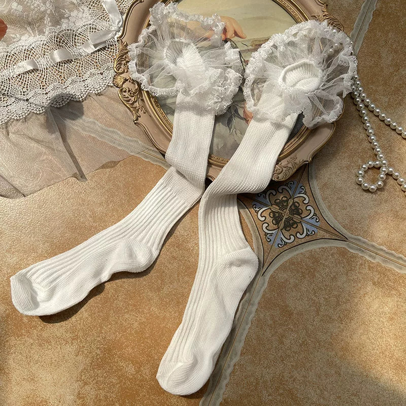 Sock Noble scrunch mid-calf socks with lace trim styled in white and black