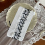 White + black crescent-strap over-the-knee lace stockings