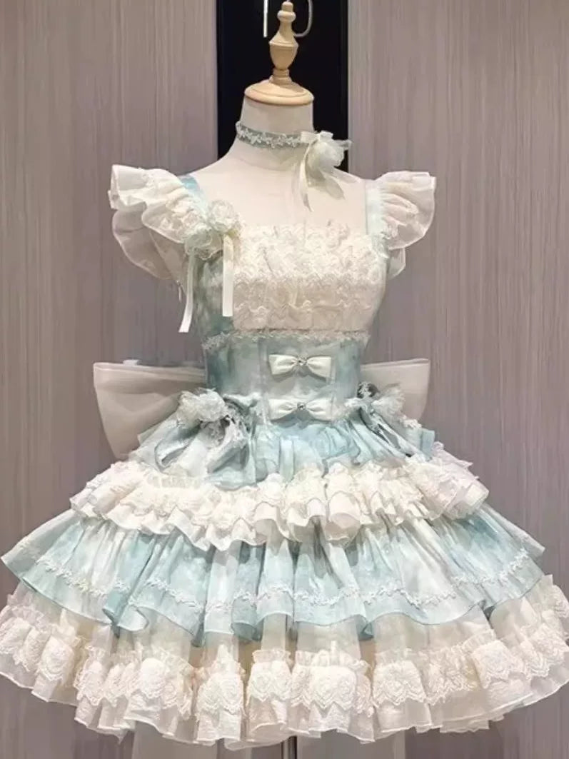 Mint-and-white tiered skirt and train on a mannequin