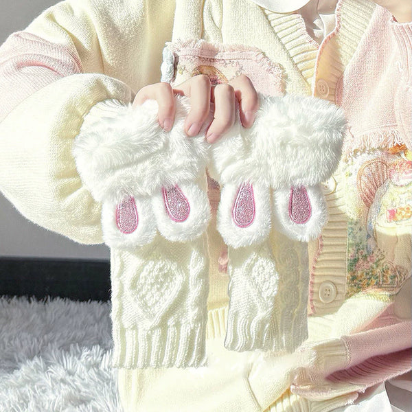 Black fingerless plush glove with ribbed cuff and animal-ear details