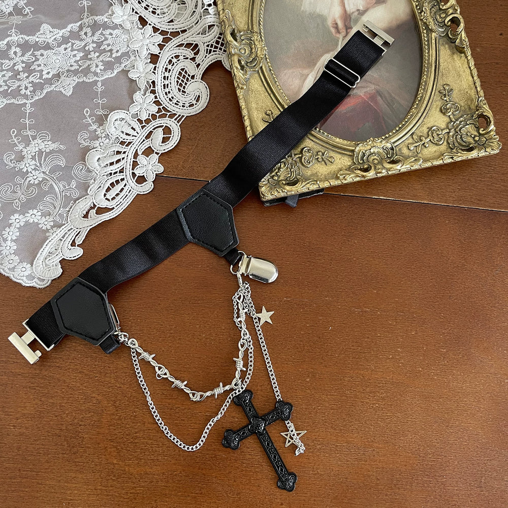 Cross-and-chain leg ring and gray socks shown in styling imagery