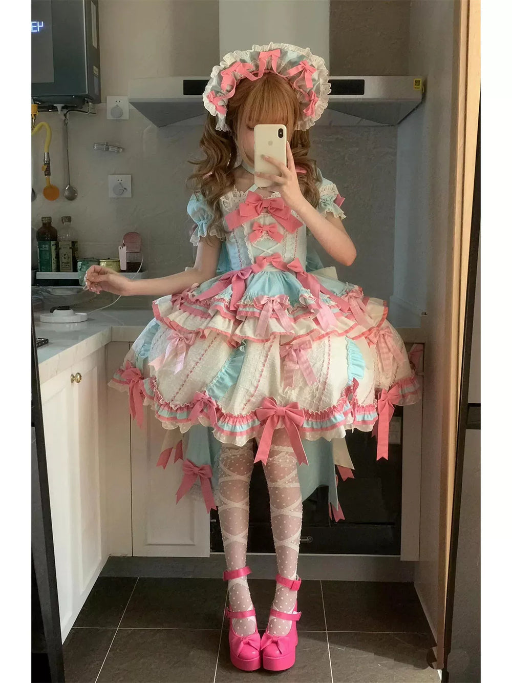 Creamy mint, pink and ivory OP dress with layered ruffles, ribbon bows, matching hat and train.