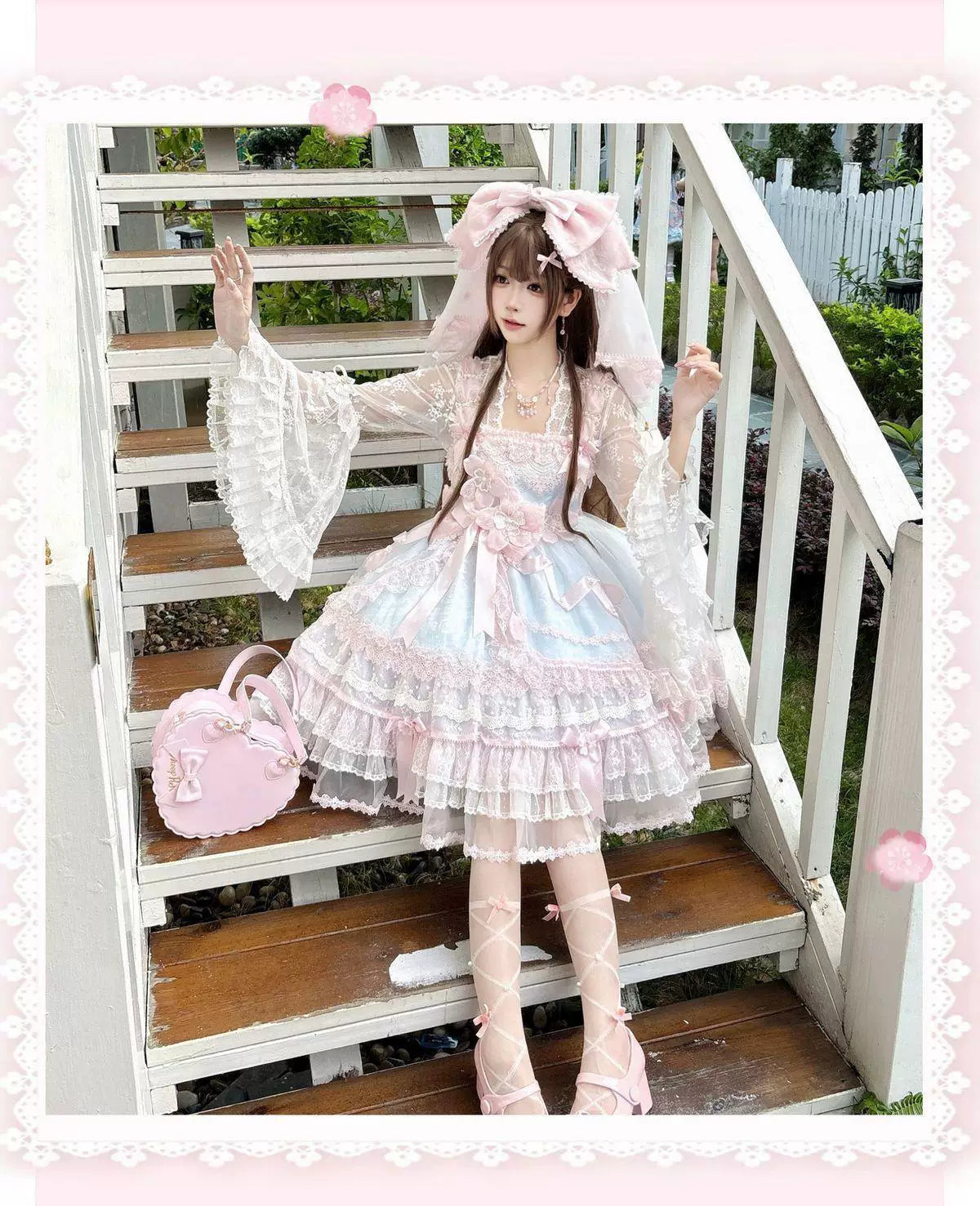 White lace long-sleeve layering top worn under a pink-and-white Lolita dress.