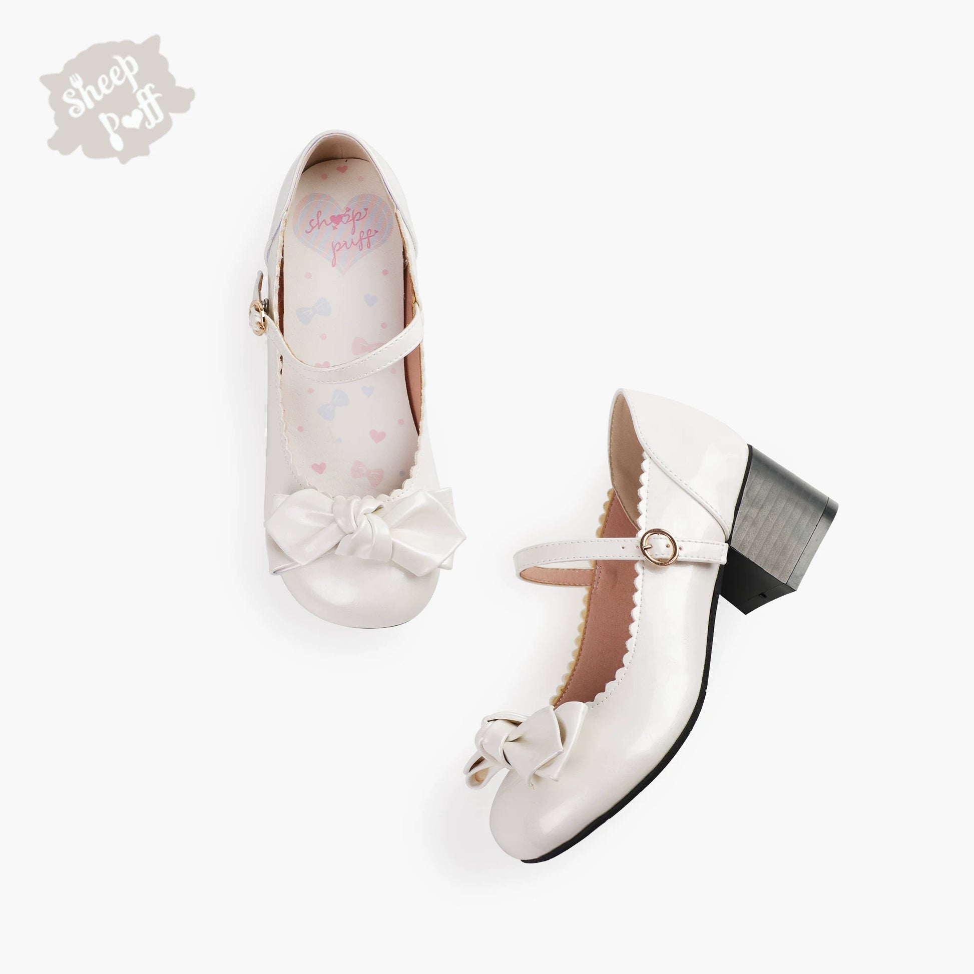 Sheep Puff Sakura matte Lolita shoes with rounded toe and bow detail, featuring a cute sheep puff design on a soft pink background.