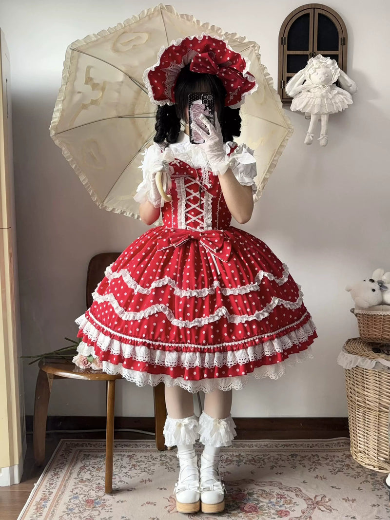 Detail of corset-style front lacing and waist bow on polka dot Lolita JSK