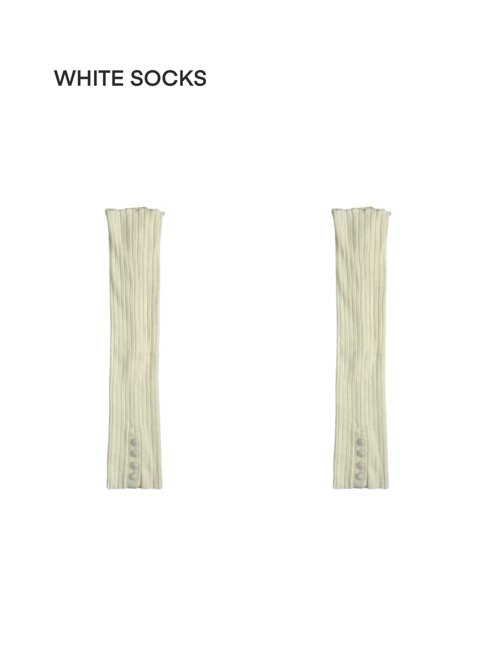 Ivory ribbed leg warmers with long tie details styled over dark tights and shoes.
