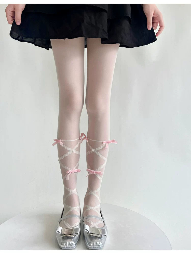 Pink sheer thigh-high Lolita tights with white crisscross lace and small pink bows