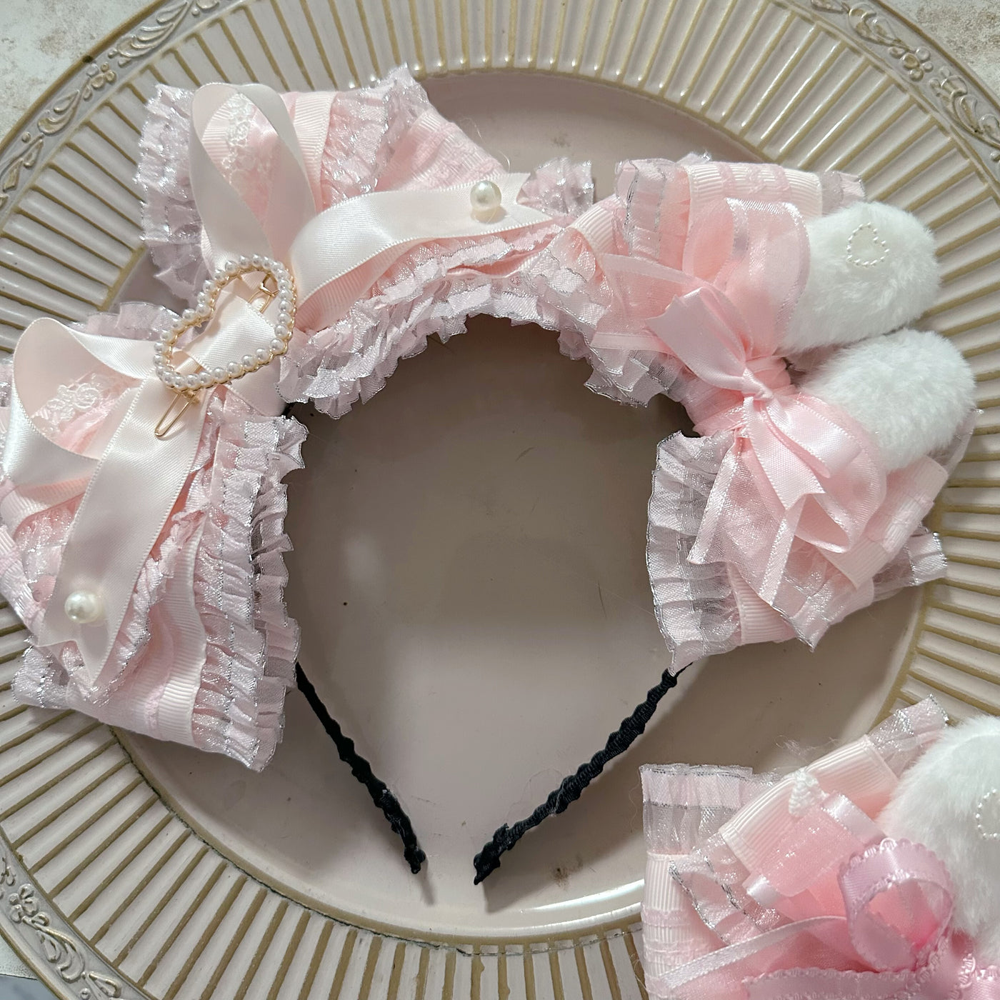 candycoco pink bunny-ear hair accessories with layered bows and pearl details