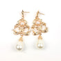 white pearl ear studs