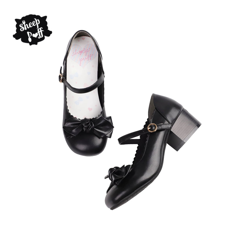 Sheep Puff Sakura matte Lolita shoes with rounded bow detail, soft pink color, and elegant design.