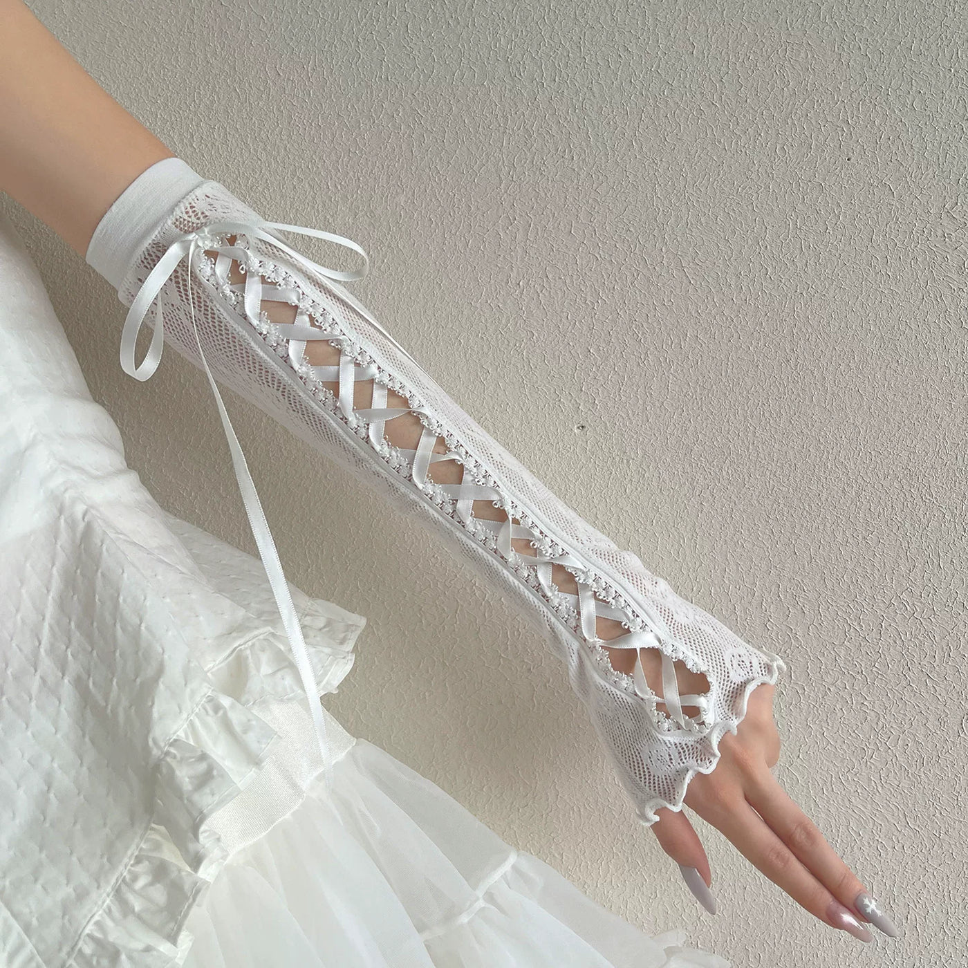White lace arm sleeve with pink ribbon tie