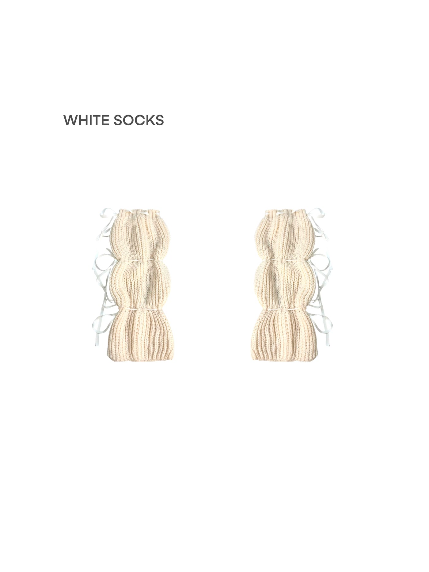 White Socks Wheat knit scrunched socks with multiple ribbon ties, styled with black shoes.